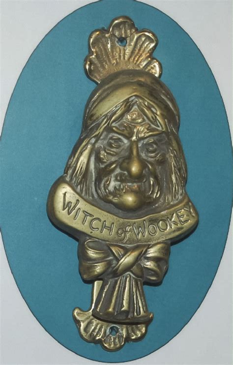 Door knocker in the shape of a witch